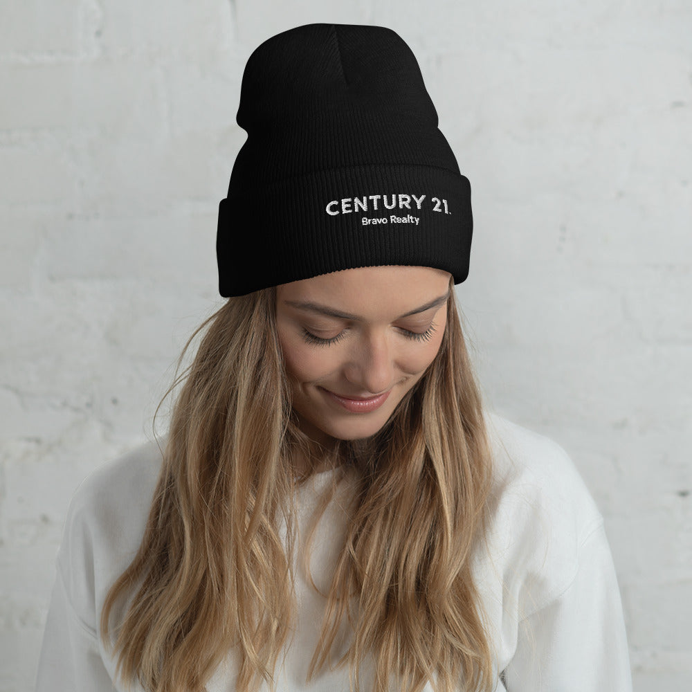 "Century 21 Bravo Realty" toque