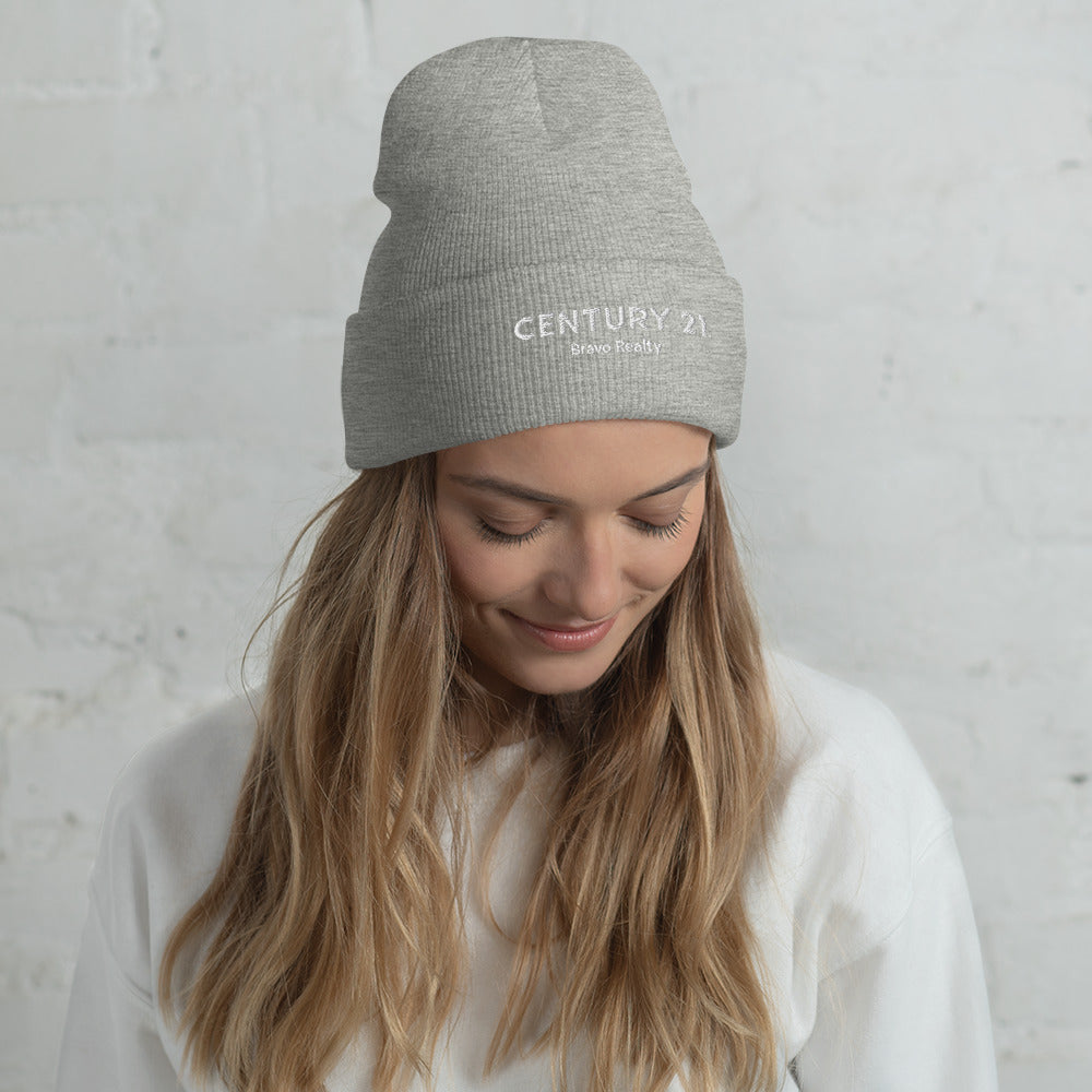 "Century 21 Bravo Realty" toque